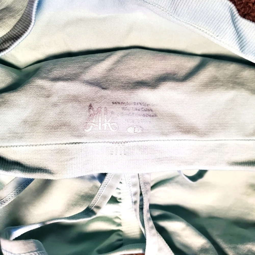 Workout Yoga Bra size L in pale green. New in package. One new without package.